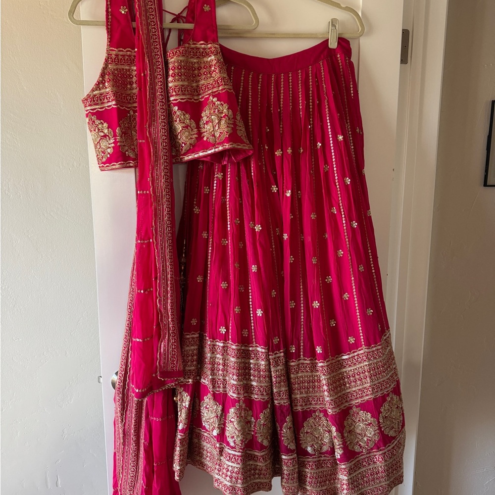 Elegant Pink Lehenga with Gold Embroidery